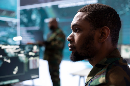 Government intelligence officer in control center manages surveillance footage, coordinate security measures and real time data. Ensuring the protection of national interests and efficiency.の写真素材