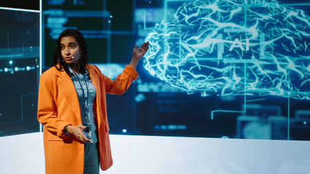 Speaker talking on stage in event bringing together leading experts, researchers, innovators and companies from around the globe to explore latest developments in AI and machine learning, camera Aの写真素材