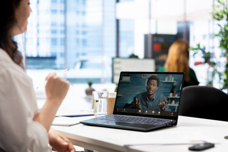Recruiter in videoconference meeting with man after finding best talent to fill open company...