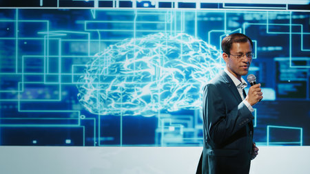 Tech company CEO using summit as platform to launch latest AI products. Manager uses mic to talk at forum to connect with business leaders and investors interested in artificial intelligence, camera Bの写真素材