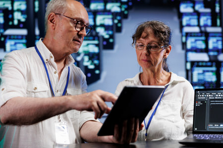 Trained wiremen running analysis on blade servers helping businesses manage databases, host websites...