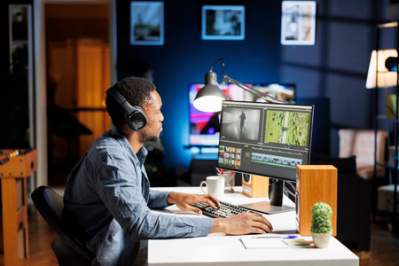 Video maker editing movie footage clips with color correction and exposure adjustments, working on...
