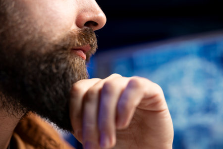 Focus on computer technician using PC in blurry background to do maintenance on artificial...
