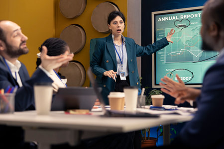 Business analyst does a presentation with project updates and details to ensure organizational...