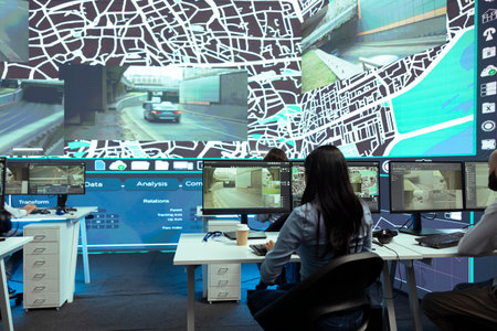 Indian system operator locating couriers in traffic to give updates on order shipping delays to clients, express delivery service in the city. Woman employee uses satellite navigation and gps.の写真素材