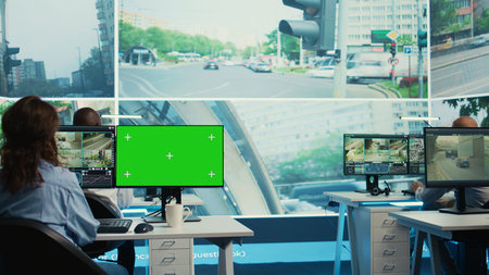 Agency operator monitoring traffic through radar surveillance with a mockup layout, using...