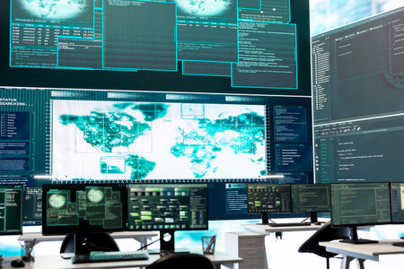 Cyber security monitoring room with high tech equipment. Governmental focus on cyber operations,...