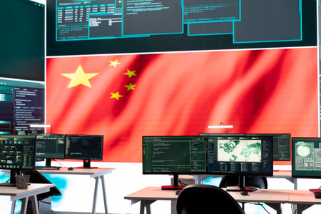 Empty governmental hacking room with chinese flag on a big screen, cyberwarfare and misinformation. Chinese propaganda, fake news and the spread of disinformation during a hybrid war.の写真素材