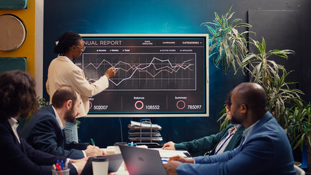 Business employee doing a presentation with project updates and timelines to ensure progress,...