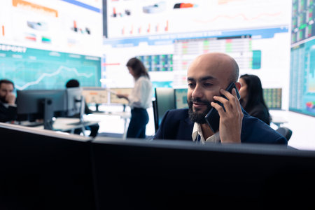 Staff member on phone call pitching an expansion idea directly to the investor, presenting key performance indicators and annual success reports in order to obtain more funds.の写真素材