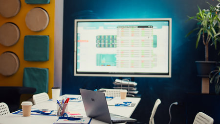 Empty executive enterprise office utilized for personnel meetings, international organization specializing in business. Interactive board set up in the conference room for debates. Camera B.の写真素材
