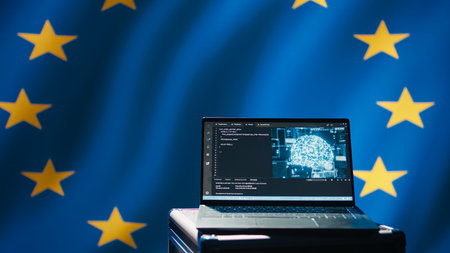 AI software on laptop used by European Union member states security services to prevent terrorism. Artificial intelligence tech used by Europe countries to defend, isolated over EU flag, camera Bの写真素材