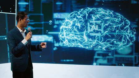 Tech company CEO using summit as platform to launch latest AI products. Manager uses mic to talk at forum to connect with business leaders and investors interested in artificial intelligence, camera Aの写真素材