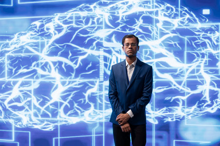 Portrait of skilled technician implementing artificial intelligence parallel processing, breaking up complex computational tasks enabling AI systems to process data faster.の写真素材