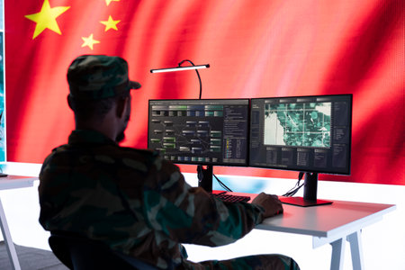 Officer analyzes critical warfare data in a Chinese military command center. Soldiers working in a control room base of operations to spread fake news for communism ideology. Chinese flag.の写真素材
