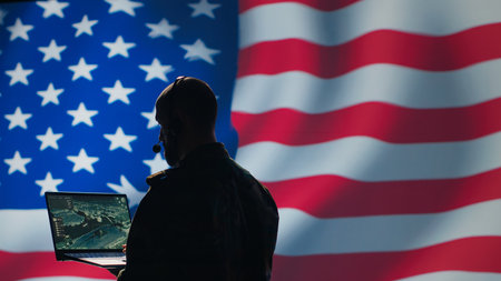 American NATO air defense operator uses radar detecting missile attacks, conducting space surveillance and satellite tracking. United States agent uses military software preventing rockets, camera Aの写真素材