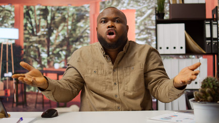 POV of professional businessman analyzing financial statistics and discussing budget allocations with investors on a videoconference from his home office. Entrepreneur on videocall meeting. Camera B.の写真素材