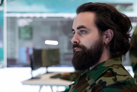 Brigadier general conducing anti terrorism operations in federal monitoring room, employing military...