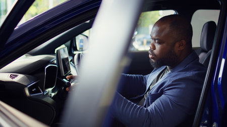 Client doing car test drive to catch any warning signs before making investment. making sure he...