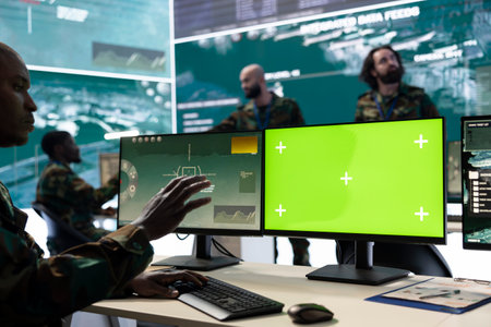 Army personnel uses isolated copy space and radar footage in general headquarters, working on a...