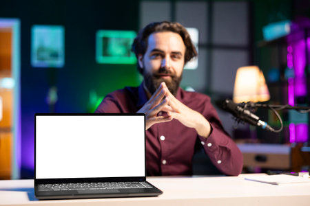 Close up shot of isolated screen laptop used by joyful content creator as empty copy space to...