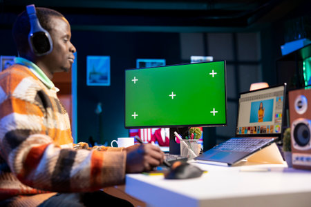Black expert photo editor working remotely in a creative industry, using his skills and software...