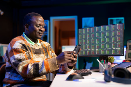 Financial expert takes a break on social media using his mobile phone, creating the capital funds...