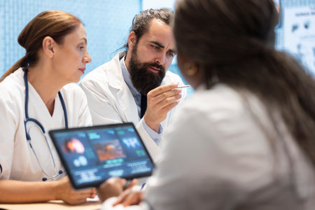 Group of diverse doctors in a treatment center reviewing brain scan results, examining neurology mri...