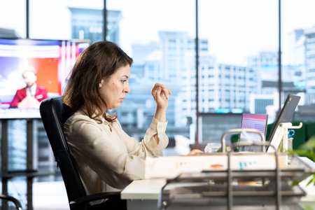 Woman general director managing multiple expansion projects, showcasing her multitasking abilities,...