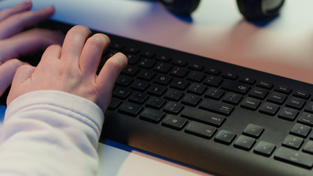 Computer technician working from home, designing and developing software applications, close up. IT...