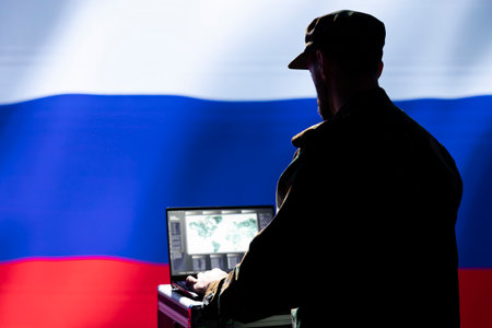 Russian Air and Space Force unit responsible for Russia air defense, relaying instructions to squadrons patrolling over borders. Kremlin regime military expert uses laptop software to do monitoringの写真素材