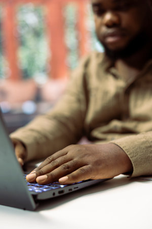 Entrepreneur working on his financial activities for his online business, doing remote work to manage the enterprise operations. Self employed person in trading industry. Close up.の写真素材