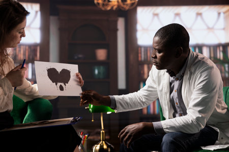 Specialist presents a Rorschach test to a doctor in white coat, looking for answers with psychoanalysis illustration. Medic surgeon suffering from PTSD and trauma, psychotherapy.の写真素材