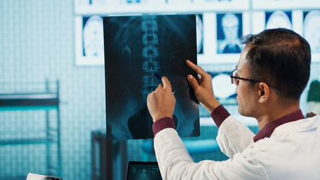 Professional doctor and patient engage in a medical check up for a scan interpretation of x ray and...