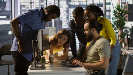 Programmers gathered together to conduct code review to fix errors, identifying technical issues with company software. Team of developers doing brainstorming, optimizing code, camera Aの写真素材
