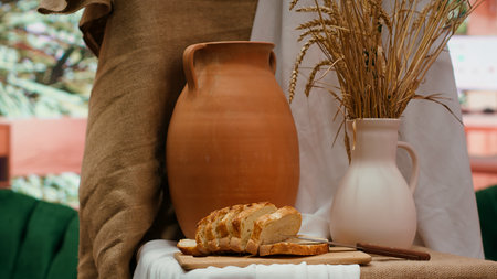 Modern paintwork supplies and coloring tubes or oil paints in creative atelier, brush kit and colorful pigments used for masterpiece creation art and craft hobby in empty workshop. Close up.の写真素材