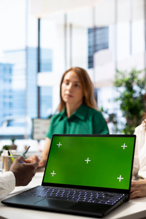 Recruiter using green screen laptop doing interview with person after finding best talent to fill...
