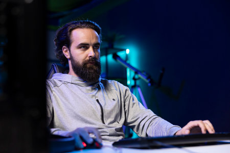 Man talking with audience during livestream, presenting helpful videogame winning strategies from...
