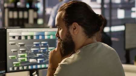 System administrator working with machine learning artificial intelligence critical to autonomous...