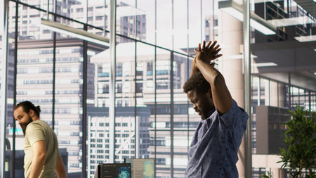 Tired admin stretches limbs while using PC for artificial intelligence computing simulating human...