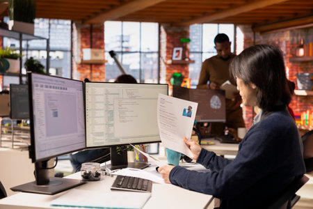 Tech startup HR senior manager vetting software development position applicants, ensuring their...
