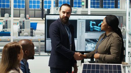 Managers in photovoltaics plant office reviewing solar technology reports. Shareholders reading...