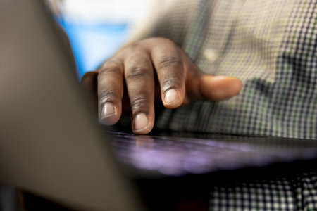 Startup director in office, building and maintaining strong relationships with business partners, looking at metrics on laptop. Close up of company CEO showing shareholders data on notebookの写真素材