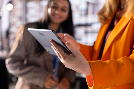 Team of women managers strategize business growth in a competitive industry, showcasing their...