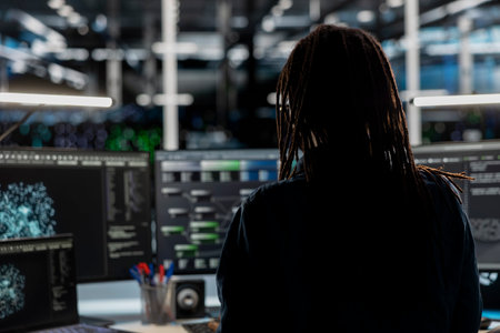 Data center employee using node trees and machine learning algorithms to analyze large datasets....