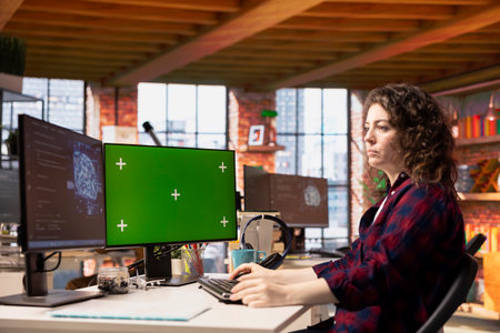 System administrator using isolated screen PC working with artificial intelligence technology in...
