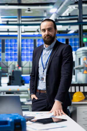 Manufacturing analyst reviewing solar panel production workflow, focusing on technological precision...