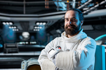 Portrait of astronaut in spacecraft running diagnostics to confirm suit integrity, preparing for...