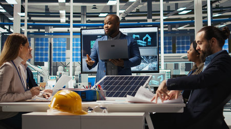 Photovoltaics plant researchers evaluating solar cells to identify weaknesses and improve energy production. Solar panels factory experts optimizing tech for better energy absorption, camera Aの写真素材