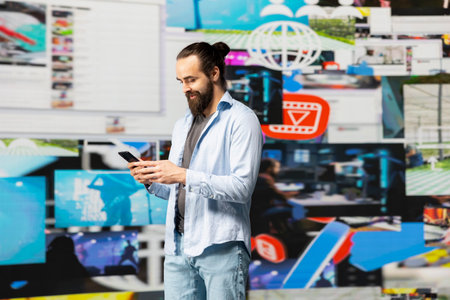 Modern online lifestyle of an influencer checking real time notifications, enjoying interaction with followers and posting creative content in a modern social network environment.の写真素材